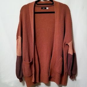 Urban Outfitters orange color block knit cardigan